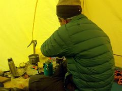 06 Lal Sing Tamang makes dinner inside our tent at Lenin Peak camp 4 6430m